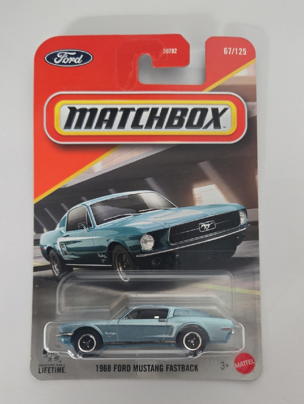 Light Blue Die-Cast Toy Car in Blister Pack